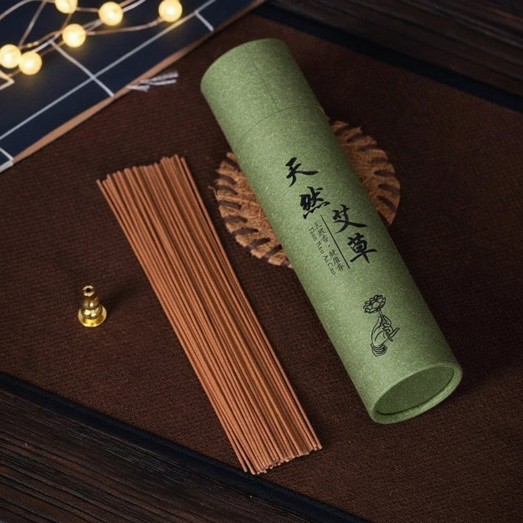 Tube of Ai Tsao (Tian Ran Ai Cao) incense sticks in a green container.