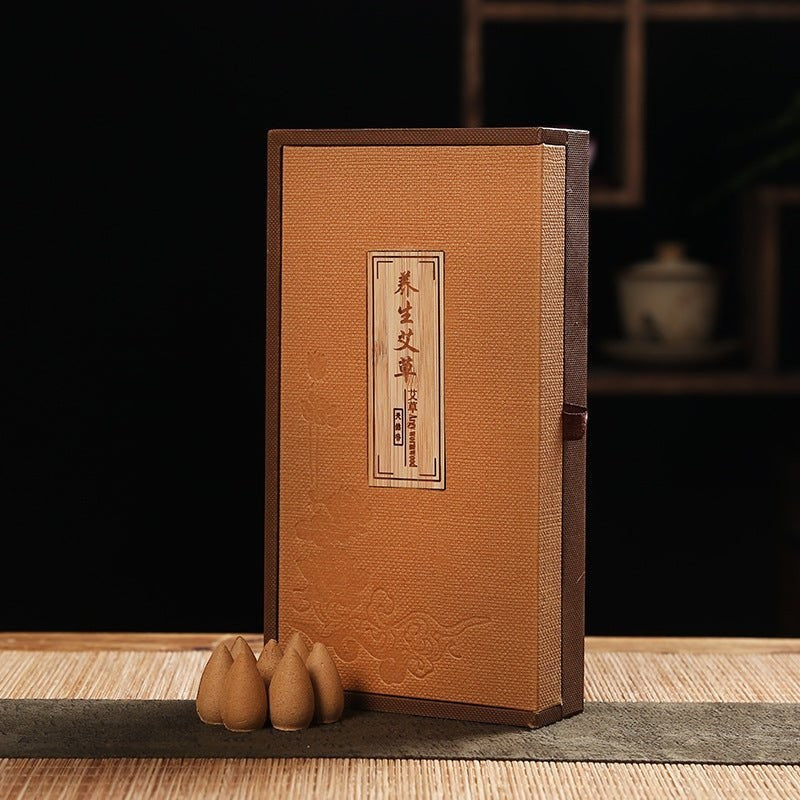 Glow & Drift Aura Capsule Ritual Box with natural botanical backflow incense cones in a linen-textured gift vault.
