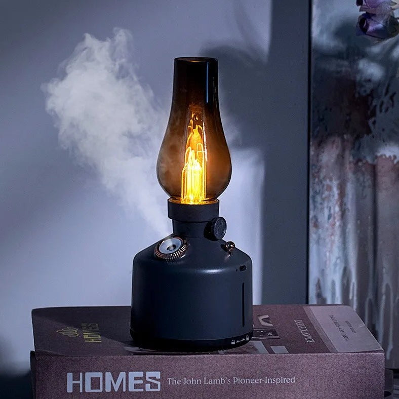 Glow & Drift Beacon Retro Lantern humidifier with a smoked glass top, warm filament light, and misting feature.