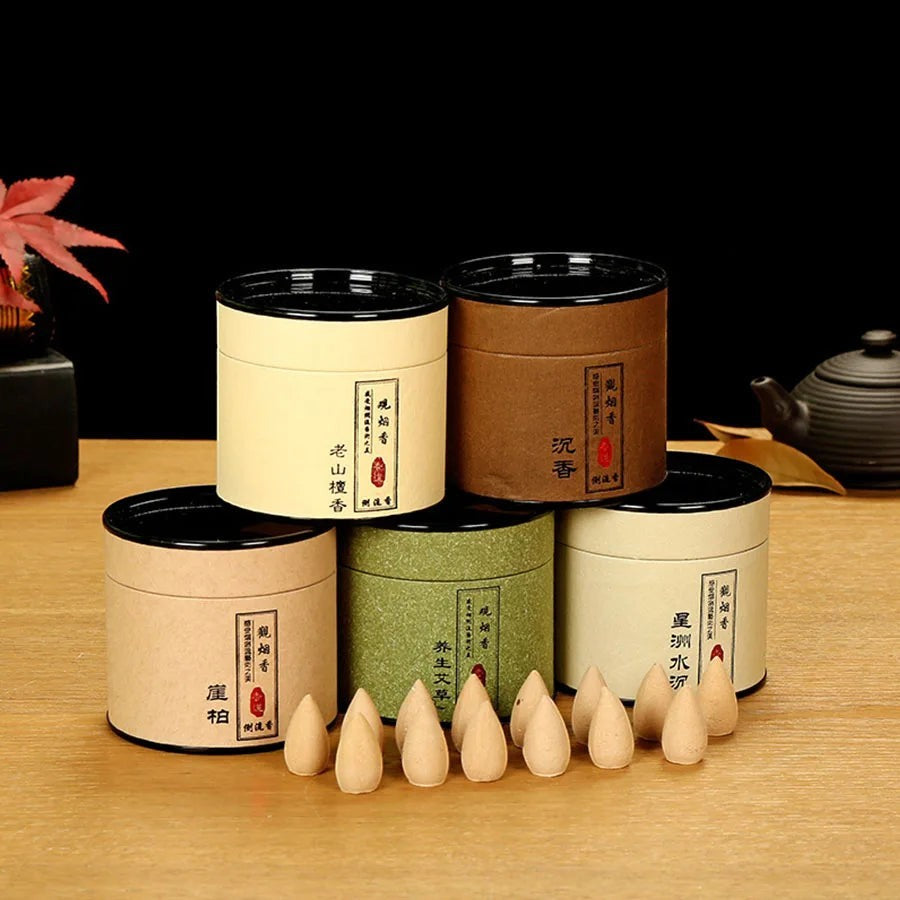Glow & Drift botanical incense cones with natural wood powder in assorted eco-friendly cylindrical gift canisters