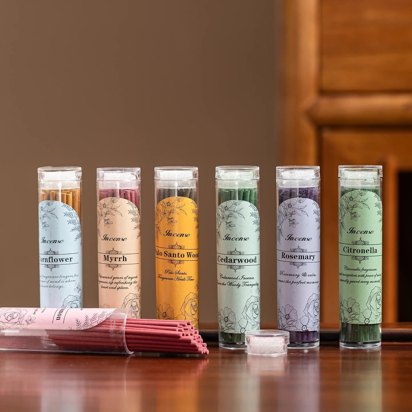 Glow & Drift incense stick collection in clear storage tubes with botanical labels for aromatherapy and home fragrance