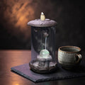 Glow & Drift Aurelian Dragon Glass Tower incense burner with Zisha clay dragon, glass cylinder, and glowing orb.