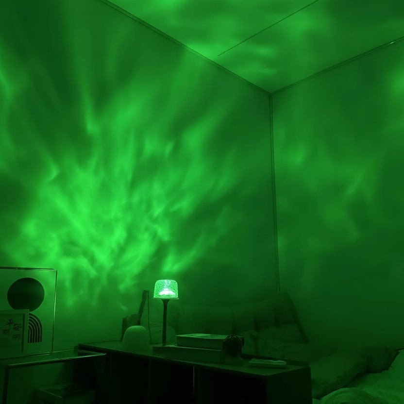 Glow & Drift Ocean Aura Projector Lamp casting vibrant green moving water ripple effects on a bedroom wall and ceiling.