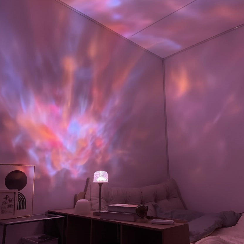 Glow & Drift Ocean Aura Projector Lamp casting vibrant, moving purple and orange ripple light effects on a bedroom wall.