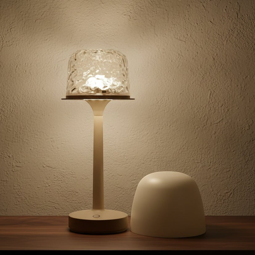 Glow & Drift Ocean Aura Projector Lamp with a textured glass dome and minimalist base on a wooden table