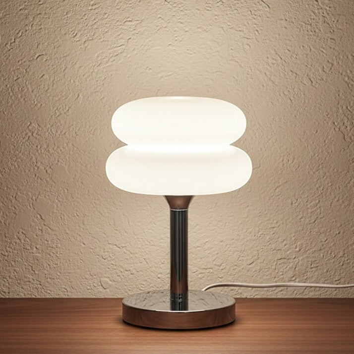 Glow & Drift retro macaron glass lamp with a stacked mushroom shade and polished steel base on a wooden table.