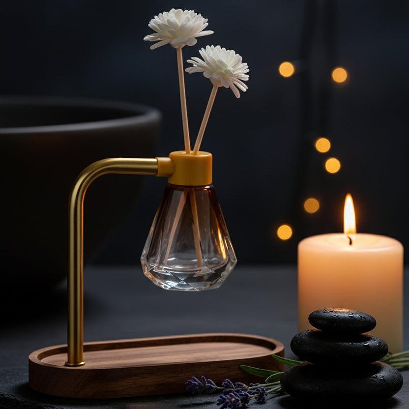 Glow & Drift Elara suspended reed diffuser with acacia wood tray, brass arm, and diamond glass vessel with floral reeds.