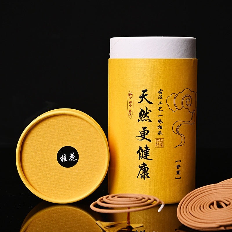 Glow & Drift Zenith Ritual Coil Incense in a yellow cylindrical gift box with natural botanical spiral incense coils.