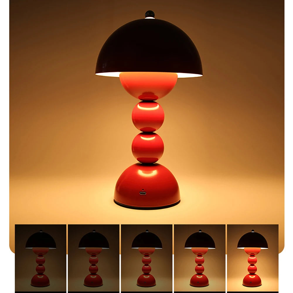 A close-up of a deep red Totem LED table lamp showcasing a five-stage stepless dimming graphic ranging from soft ambient to bright light.